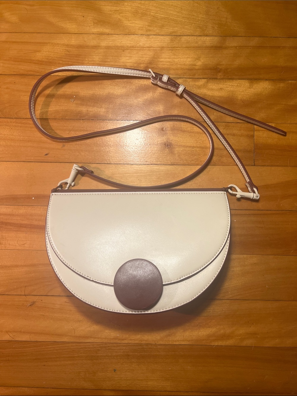 Charles & Keith Half-Moon Button Crossbody Bag